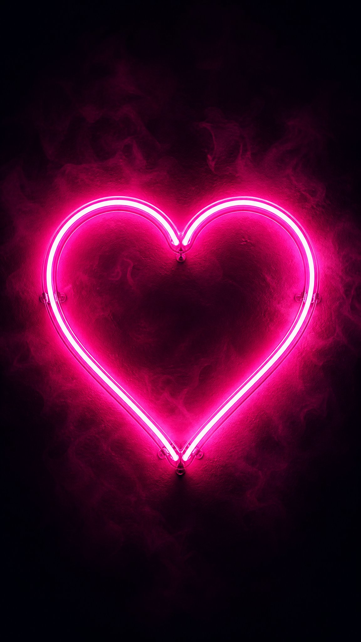 Neon Glow Electric Pink Heart Sign Against a